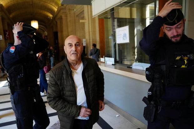 Yunice Abbas, one of the men accused in the 2016 armed robbery of Kim Kardashian, arrives at the palace of justice April 28, 2025, in Paris. 
